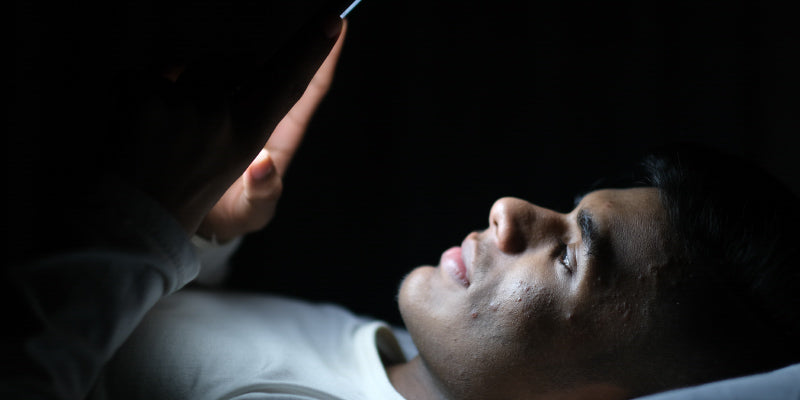 A man practicing mindful breathing during a dopamine detox to improve their sex life.