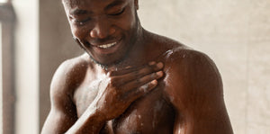 Man using intimate hygiene products in the shower for better men's wellness and intimate health care."