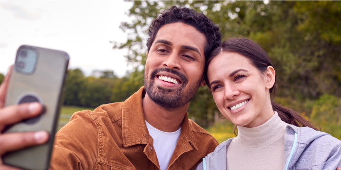 Two friends sharing a meaningful look that hints at a connection beyond friendship.