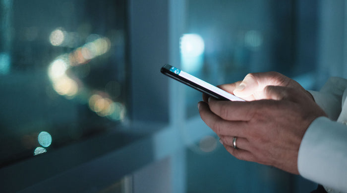 Young man hands chatting on the phone
